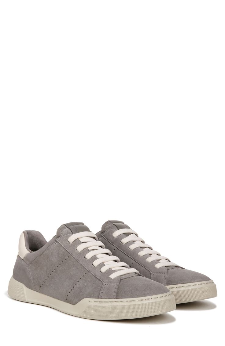 Slight perforations lend superior breathability to the smooth leather upper of this low-profile lace-up sneaker. Leather upper and lining/rubber sole Imported Gray Low-top Sneakers With Perforated Toe Box, Gray Lace-up Sneakers With Perforations, Classic Slip-on Sneakers With Contrast Sole, Classic Suede Slip-on Sneakers, Leather Slip-on Sneakers For Light Sports, Modern Slip-on Sneakers With Perforations, Low-top Perforated Slip-on Sneakers For Sports, Sporty Slip-on Sneakers With Vented Sides, Classic Gray Sneakers With Textured Sole