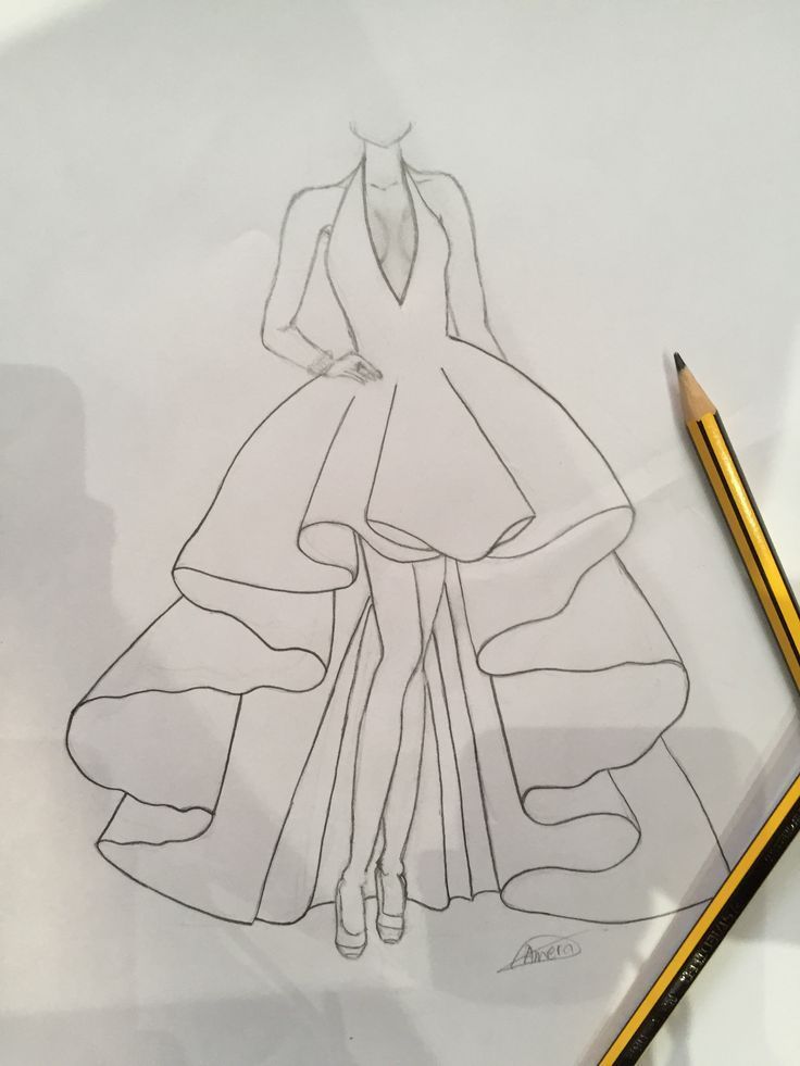 a drawing of a woman in a long dress on paper with a pencil next to it