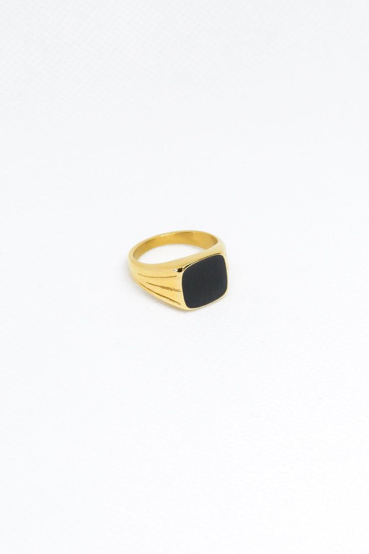 The boldest of them all the Onyx Ring. Whether solo or stacked everyone will see you. Materials: 14k-Gold Filled Stainless Steel, Black Onyx Details: US size 6 & 7﻿, Black Minimalist Signet Ring For Everyday, Everyday Black Signet Ring With Polished Finish, Minimalist Black Tarnish Resistant Rings, Minimalist Black Tarnish-resistant Rings, Modern Black Tarnish Resistant Signet Ring, Modern Black Tarnish-resistant Signet Ring, Adjustable Black Minimalist Signet Ring, Modern Black Tarnish-resistant Jewelry, Classic Black Stackable Jewelry