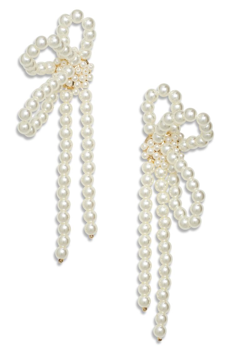 Luminous faux pearls shape these beautiful bow earrings that feel like a gift that keeps on giving every time you wear them. Faux pearl/goldtone plate Imported Evening Pearl Jewelry With Bow Detail, Evening Pearl Jewelry With Bow, Nordstrom Elegant Gold Jewelry, Elegant Nordstrom Gold Jewelry, Formal Pearl Earrings With Bow Detail, Formal Pearl Earrings With Bow, Party Pearl Jewelry With Bow, Elegant Nordstrom Earrings For Gift, Gossip Girl Party