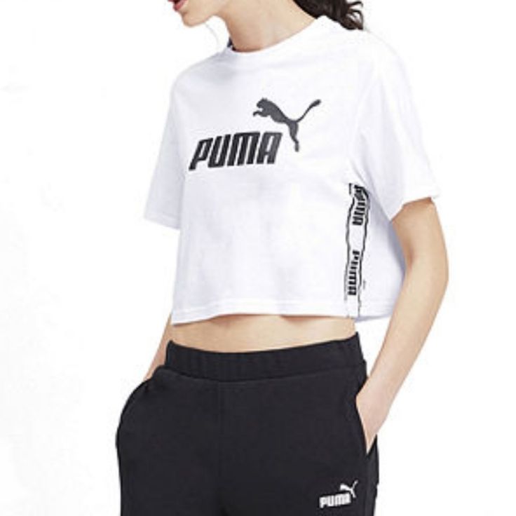 New. Relaxed Fit. Crewneck. Logo On Front . Pit To Pit 24". Length 20". Sporty Puma Logo Tops For Streetwear, Puma Logo Cotton Short Sleeve Top, Cotton Puma Logo Top For Streetwear, Puma Logo Cotton Top For Streetwear, White Puma Logo Crew Neck Top, Short Sleeve Cotton Top With Puma Logo, White Puma Logo Top For Streetwear, Puma Cotton Top For Streetwear, Cotton Short Sleeve Tops With Puma Logo