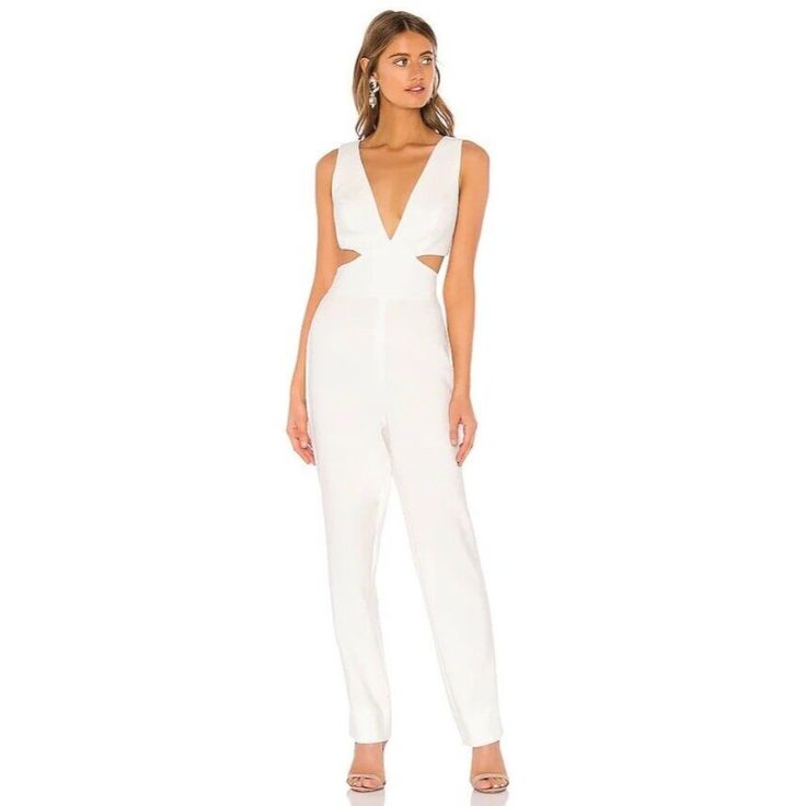 New ! Size L Self & Lining: 88% Poly, 12% Spandex Mid-Weight Crepe Fabric Waist Cut-Out Side Seam Ankle Slits Back Strap With Hook And Eye Closure Partial Back Zipper Closure Body Measures Approx 30" In Length 16" At The Knee Narrows To 15" At The Leg Opening 478 Bcbgmaxazria Plunging Jumpsuit Off White Cut Out Party Wedding L Nwt $298 Elegant Fitted Jumpsuit With Cutout Details, Elegant Fitted Jumpsuit With Cutout, Elegant Fitted Jumpsuits And Rompers With Cutout, White Cutout Dress, Pants Romper, Designer Jumpsuits, Printed Jumpsuit, Revolve Clothing, Sleeveless Jumpsuits