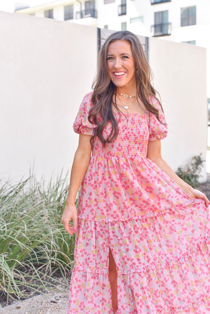 Pink Flowy Maxi Dress With Smocked Bodice, Flowy Pink Maxi Dress With Smocked Bodice, Pink Maxi Dress With Smocked Back For Vacation, Pink Feminine Maxi Dress With Smocked Bodice, Pink Tiered Maxi Dress With Smocked Back, Spring Maxi Dress With Smocked Bodice, Modest Spring Dress With Smocked Back, Pink Smocked Maxi Dress For Spring, Spring Modest Smocked Dress With Smocked Back