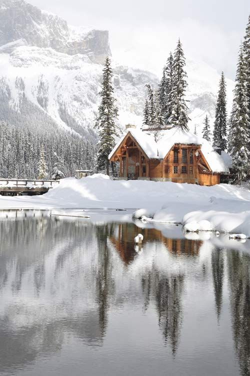 a cabin in the snow with a bible verse