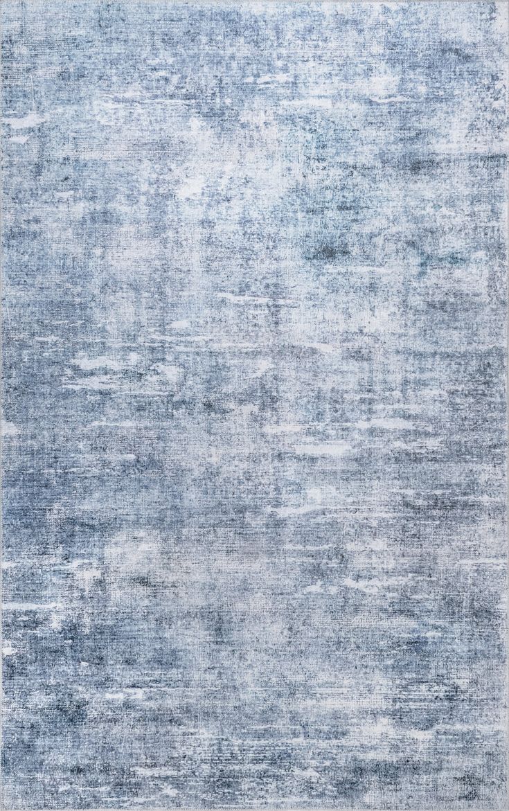 an area rug with blue and white colors