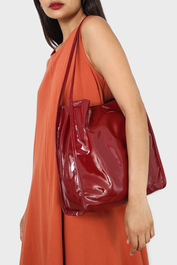 - Measurements: 1. Width: 32cm, 2. Height: 31cm- Materials: 100% polyurethane- Thickness: Moderate- Sheerness: None- Stretch: None- Lining: None- Care: Do not wash, spot clean Red Leather Bags With Glossy Finish, Chic Red Bag With Glossy Finish, Everyday Glossy Finish Shoulder Bag, Chic Glossy Finish Shoulder Bag For Travel, Chic Glossy Shoulder Bag For Travel, Glossy Finish Satchel Shoulder Bag, Glossy Leather Tote Bag, Modern Shoulder Bag For Weekend, Modern Glossy Finish Shoulder Bag For Everyday