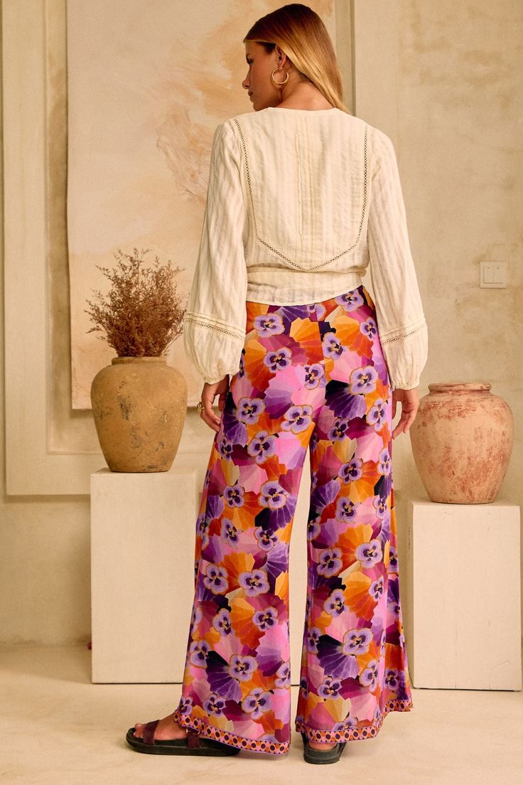 Casual and chic, our Palazzo pants are the ultimate statement pant to add to your wardrobe rotation. Designed in our much loved Ecovero Viscose Crepe which offers a soft hand-feel and drape, these pants are designed to sit high on the waist with a comfortable elasticated back waistband and dramatic wide-leg. The Palazzo is the ultimate pant to dress up with matching Jolie Blouse - Disco Dust for a statement set moment or with the Siren Top - Caramel. Julia wears size AU 8 and is 180cm. Sam (in s Siren Top, Statement Pants, The Siren, Palazzo Pant, Nine Lives, Soft Hands, Palazzo Pants, Soft Hand, Spring And Fall