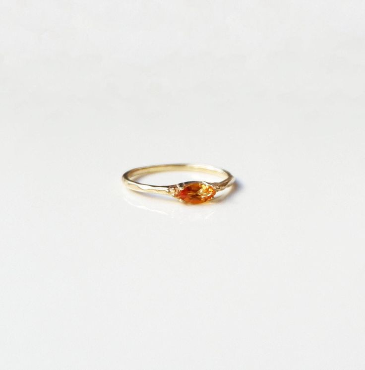 14k Gold Citrine Ring, 14k Gold Dainty Marquise Citrine Ring, 14k Gold Minimalist Citrine Ring, Stacking Citrine Ring Marquise Citrine Ring ✦ Product Features: ● Made to order ● Materials: Solid Gold ● Gold Kt: 9K, 14K, 18K  ● Gold color: Rose Gold, White Gold, and Yellow Gold ● Setting: Natural Citrine ● Total number of stones: 1 ● Total Citrine ctw: 0.20 ctw  ● Band width: 1.10mm ● Ready to ship: 7-10 business working days (excluding weekends) ✦ Gemstone Certificate: ● Absolutely, if you wish 14k Gold Topaz Promise Ring With Gemstone Accents, 14k Gold Topaz Ring With Gemstone Accents For Promise, 14k Gold Topaz Gemstone Ring For Promise, 14k Gold Topaz Ring For Promise, Amber Promise Ring In Fine Jewelry Style, Amber Topaz Birthstone Ring In Fine Jewelry Style, Yellow Gold Topaz Gemstone Promise Ring, Yellow Gold Topaz Ring For Promise, Promise Yellow Gold Topaz Birthstone Ring