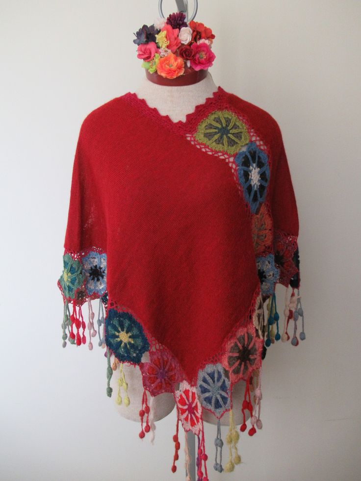 Beautiful and Unique Poncho with 100% Baby Alpaca This red gorgeous poncho is handknitted with a very thing thread of 100% baby alpaca that was naturally dyed with plants in the Altiplano of Peru, handmade by women from Pisac in the Andes of Peru. Alpaca wool is one of the most resistant and soft fibers in the world, it does not cause allergies, it is lightweight and so comfortable that its special for hand knitting. Alpaca wool is naturally breathable. We believe in the properties of natural fi Red Bohemian Poncho For Festival, Bohemian Alpaca Shawl For Winter, Multicolor Bohemian Wool Poncho, Bohemian Handwoven Wool Poncho, Red Bohemian Poncho For Winter, Folk Style Red Poncho For Winter, Red Folk Style Poncho For Fall, Red Bohemian Shawl Poncho, Traditional Red One-size Poncho