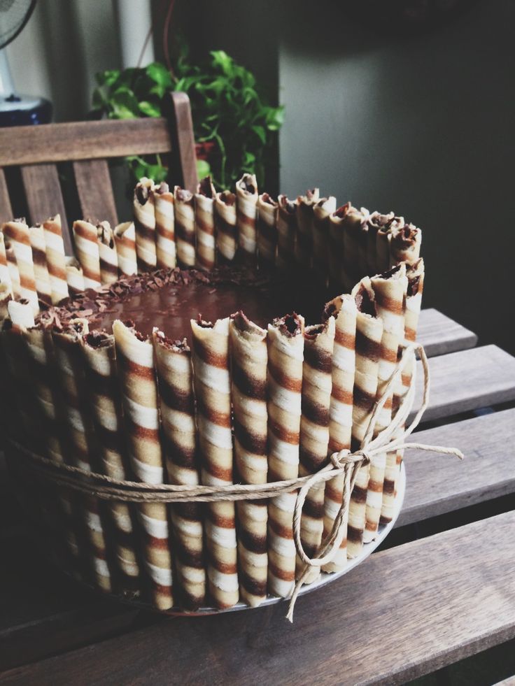 a cake sitting on top of a wooden table