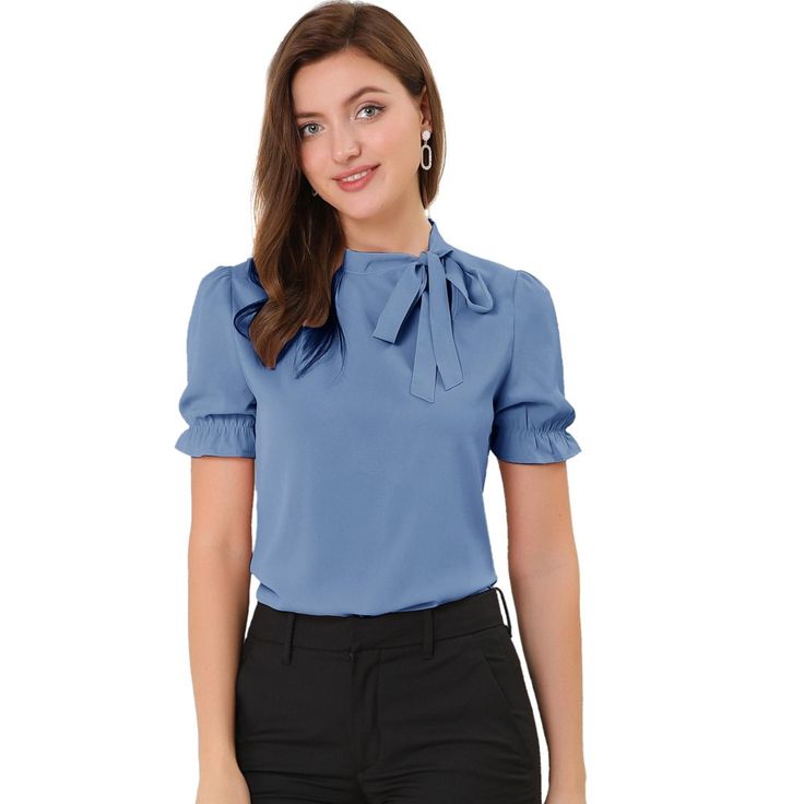 This relaxed fit blouse will compliment many body types to keep you looking best all the day. Soft woven poly shapes a gathered neck, straight-cut silhouette, framed by puffy short sleeves with elastic cuff. Your wardrobe is not complete without this elegant office shirt. Pair with high waist pants and heels for easy chic style. A sweetly bow tie details lends an elegant air to an everyday top. Size: small. Color: blue. Gender: female. Age Group: adult. Pattern: Solid. Material: Polyester. Tie Neck Shirt, Bow Tie Blouse, Elegant Office, Tie Neck Tops, Fitted Blouses, Work Wear Women, Work Tops, Tie Blouse, Elegant Shirt