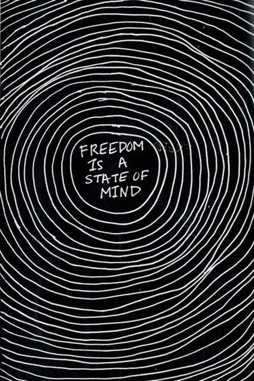 a black and white photo with the words freedom is a state of mind