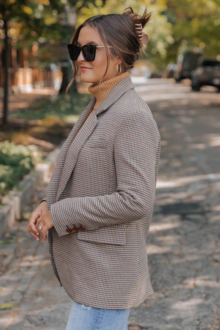 The Boss Babe Oversized Plaid Blazer is a must-have for any stylish professional! With its long sleeves, buttoned cuffs, and notched collar, this blazer exudes confidence and power. The oversized fit and allover plaid pattern add a touch of trendy flair. Made from high-quality materials, this blazer will keep you comfortable and stylish all day long. Layer it over a basic tank top or bodysuit and then pair with jeans, ankle booties, and a matching crossbody bag for an elevated boho chic look! Oversized Workwear Blazer With Button Cuffs, Oversized Blazer With Button Cuffs For Work, Oversized Button-up Business Blazer, Oversized Lapel Collar Blazer For Office Wear, Oversized Blazer With Hidden Button Closure For Office, Oversized Blazer With Button Closure And Suit Collar, Oversized Button-up Blazer For Work, Oversized Single Button Blazer For Work, Oversized Linen Blazer For Workwear