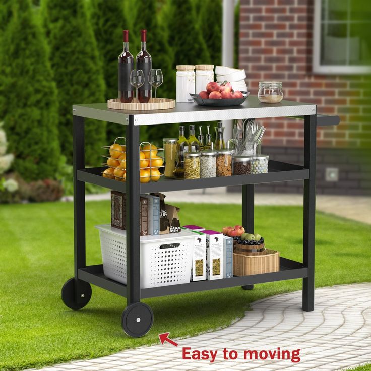 an outdoor bar cart with drinks and snacks on it