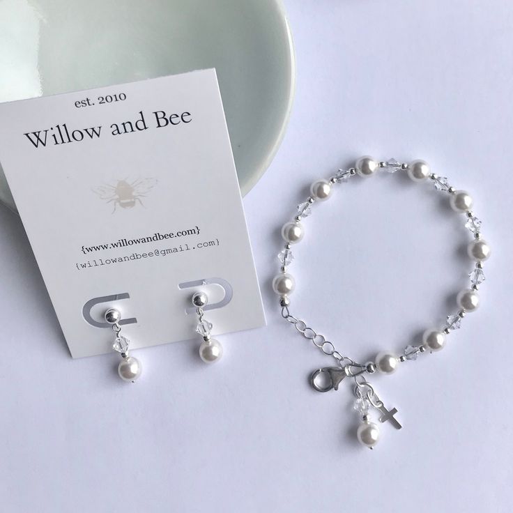 This lovely First Communion bracelet and earrings set is sure to be the perfect gift! The beautiful bracelet doubles as a single decade rosary. This classic bracelet has been a big seller as First Communion jewelry, Confirmation jewelry, Easter bracelet, Flower Girl gift, Maid-of-Honor jewelry, Bridesmaids matching bracelets, Mother-of-the-Bride jewelry, Godmother gift, and as Bridal jewelry. Description: -Bracelet measures 5 ½ inches plus a 1-inch extension chain -fits First Communion age (2nd Classic Adjustable Jewelry For First Communion, Elegant Sterling Silver Jewelry For First Communion, Nickel-free Rosary Bracelet As Gift, Dainty Hypoallergenic Jewelry For First Communion, White Bracelet For First Communion, White Bracelet Jewelry For First Communion, White Sterling Silver Rosary Bracelet Gift, Adjustable Jewelry For First Communion Mother's Day, Adjustable Jewelry For First Communion And Mother's Day