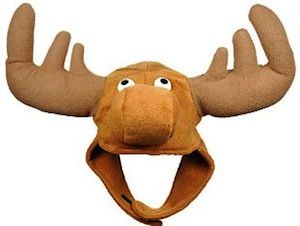 a stuffed moose head with antlers hanging from it's side on a white background