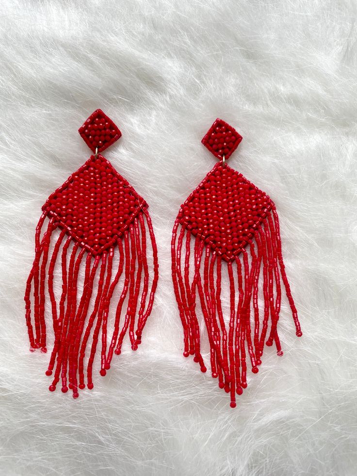 This item is available for local pick up from Magnolia, TX or select a shipping option and have it shipped directly to you. Long Diamond Shape Tassel Statement Beaded EarringApproximately 4.5" Length Trendy Red Festival Jewelry, Trendy Red Jewelry For Evening, Red Beaded Earrings For Festival, Trendy Red Party Earrings, Trendy Red Jewelry For Festive Occasions, Trendy Red Festive Jewelry, Red Festival Earrings, Trendy Handmade Red Earrings, Trendy Red Beaded Earrings