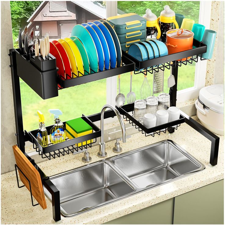 a kitchen sink filled with lots of colorful dishes