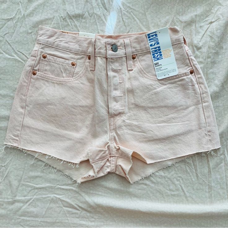 Nwt, Great Condition Sizes 26 And 27 Available Orig. $70 High Rise Pastel Pink Raw Hem Button Fly Fitted Jean Shorts With Buttons For Spring, Fitted Jean Shorts With Button Closure For Spring, Levi's Bottoms With Buttons For Spring, Fitted Cutoff Jean Shorts With Button Closure, Levi's Bottoms For Spring, Levi's Buttoned Bottoms For Spring, Spring Relaxed Fit Shorts With Buttons, Trendy Levi's Bottoms With Buttons, Levi's Summer Bottoms With Buttons