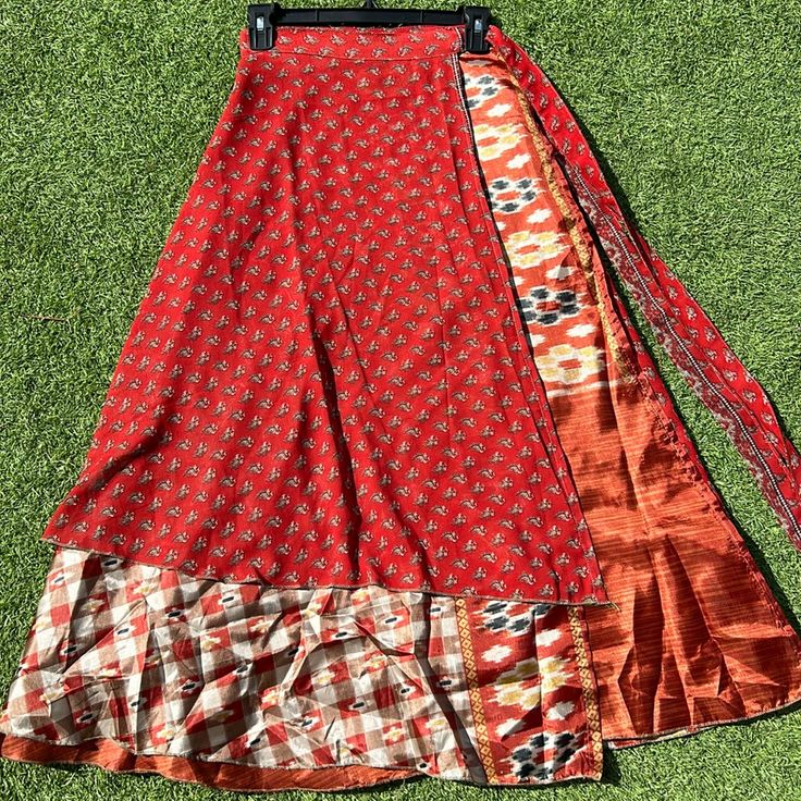 Reversible Silk Wrap Skirt One Size Fits Most Length: 36 Inches Can Wrap Up To 44 Inches Of Waist New Without Tags, Handmade In India Using Recycled Sari. There May Be Imperfections In The Fabric. Can Be Worn In A Multitude Of Ways! Comes From A Pet-Free And Smoke-Free Home. *Darn Good Yarn Tagged For Exposure. Sari Saree Vintage Silk Magic Wrap Maxi Midi Skirt Dress Floral Wedding Party Attire Summer Beach Vacation Darn Good Yarn Wevez Bohemian Boho Sustainable Creative Office Holidays Christma Floral Wedding Party, Wedding Party Attire, Saree Vintage, Magic Wrap, Silk Wrap Skirt, Creative Office, Summer Beach Vacation, Party Attire, Office Holiday