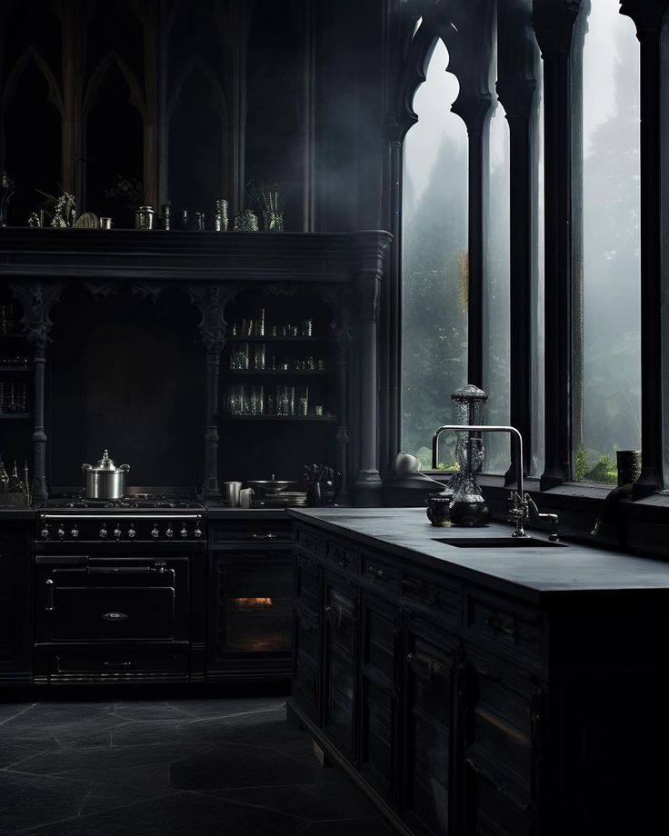 an old fashioned kitchen with black cabinets and dark lighting