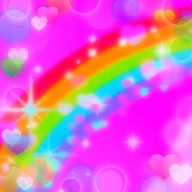 a rainbow colored background with hearts and stars