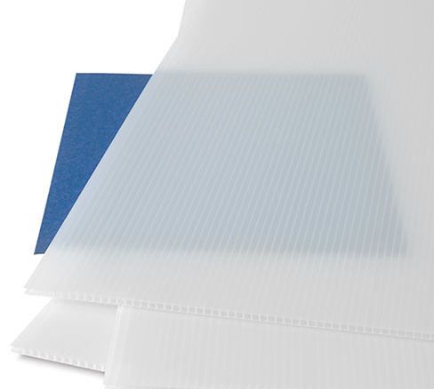 two sheets of white and blue paper next to each other