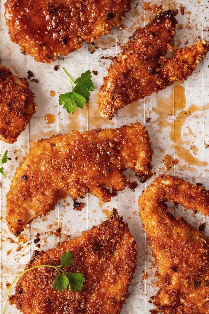 fried chicken pieces with parsley on top