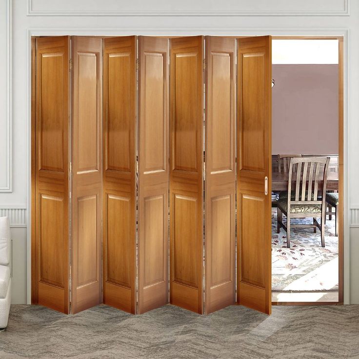 the room divider is made out of wood and has four doors on each side