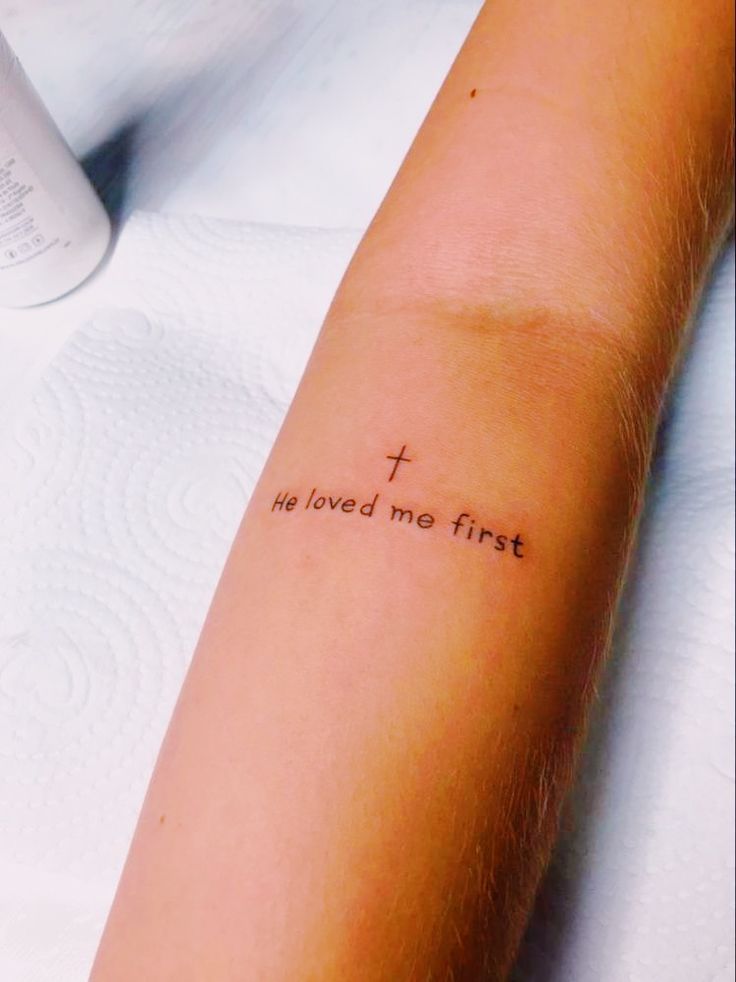 a woman's arm with a tattoo that says, i loved me first on it