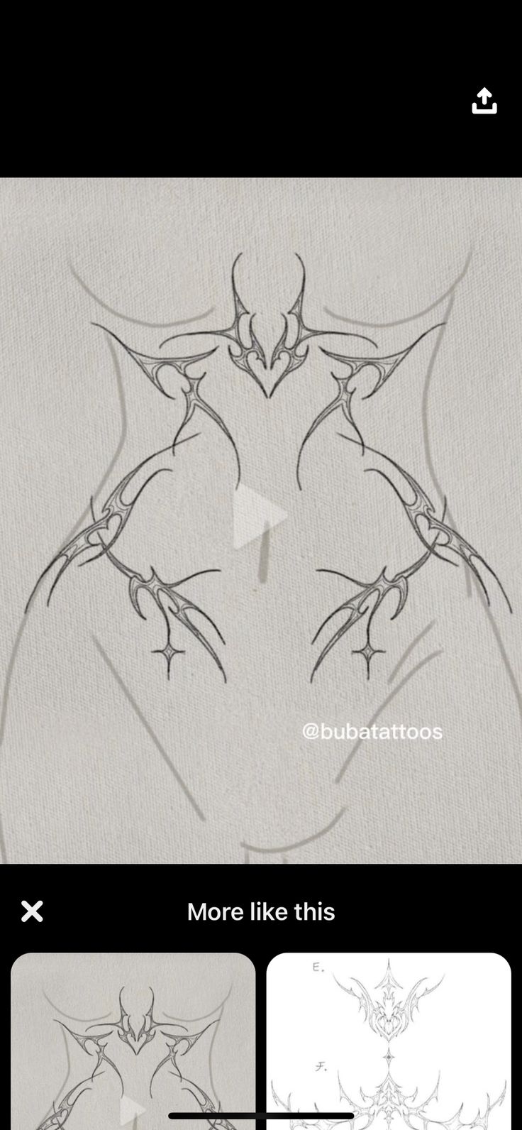 an image of the back side of a woman's body with branches drawn on it