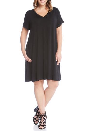 The LBD for every day is cut from rich stretch jersey and simply styled so you can doll it up or keep it laid-back, depending on your mood. 38 1/2" length (size 2X) Slips on over head V-neck Short sleeves Side seam pockets 92% rayon, 8% spandex Machine wash, line dry Made in the USA Encore Black Travel Dress, Black Plain Dress, Dress Minimal, Plus Size Work, Travel Dress, Black Travel, Karen Kane, Shift Dress Black, Little Dresses