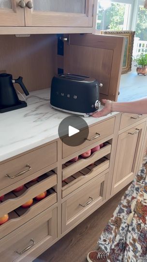 a kitchen with an oven, toaster and counter top in the middle of it