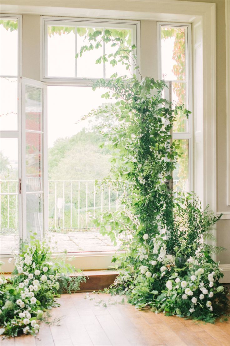 A deconstructed foliage archway with delicate white flowers created in a natural style Foliage Wedding Decor, Natural Wedding Flowers, Flowers Display, Green Wedding Decorations, Timeless Bride, White Wedding Arch, Summer Wedding Ceremony, Green Wedding Flowers, Floral Arch Wedding