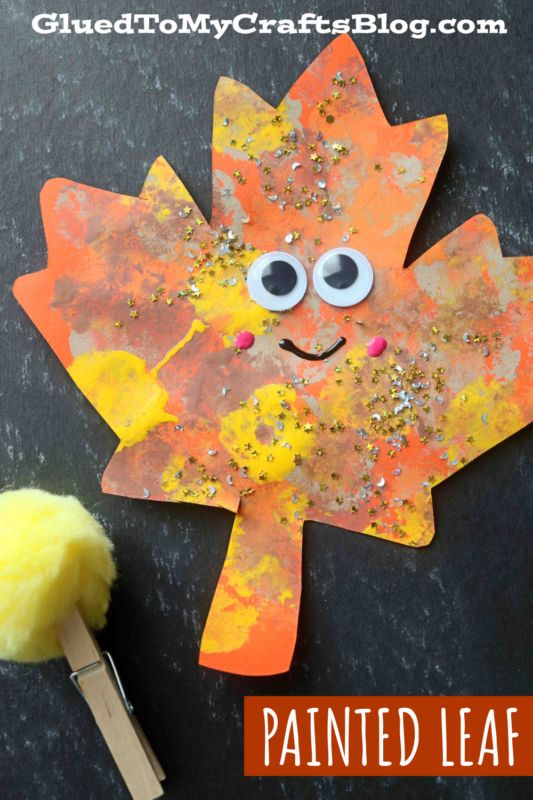 a paper leaf with googly eyes on it next to a paintbrush and the words painted leaf