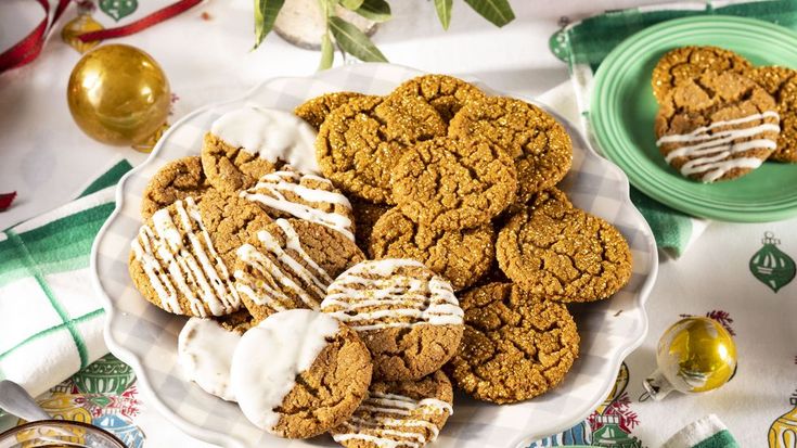 a white plate topped with cookies covered in frosting