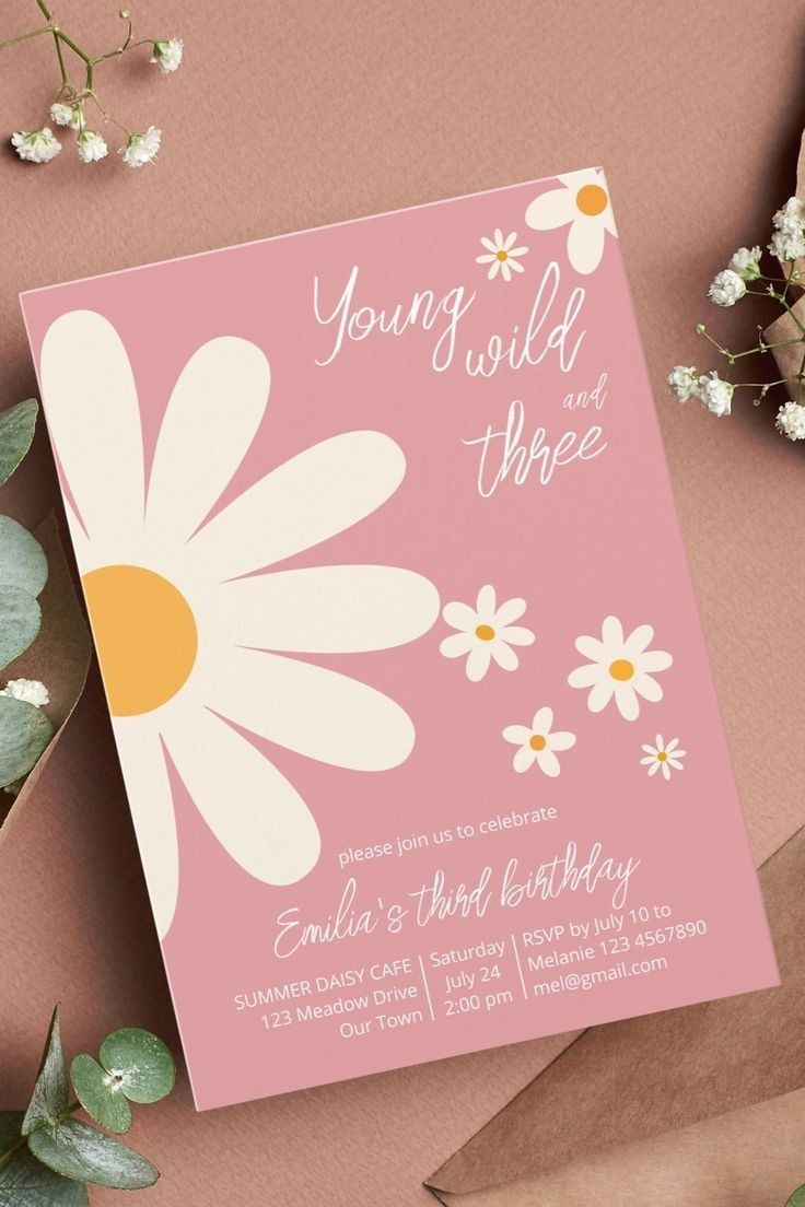 a pink and white flower birthday card with the words young wild things on it next to some flowers