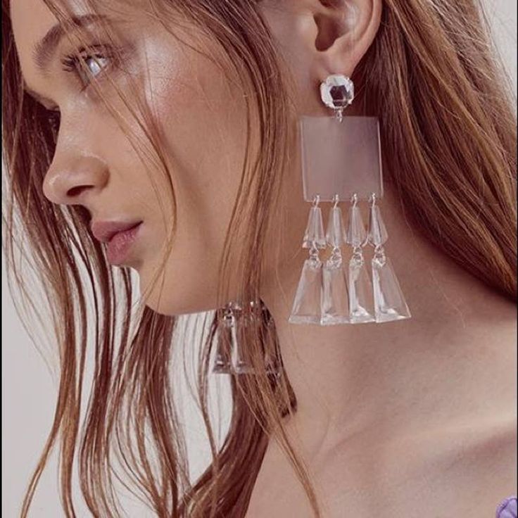 For Love & Lemons Jordyn Earrings Crystal Clear Silver Tone Earrings. Lucite Stone And Tassel Accents. Post Back Closure. Measures Approx 4" Dangling Original Retail $85 Bundle & Save! Always Considering Reasonable Offers :) Crystal Ball Earrings, Celine Earrings, Pink Crystal Earrings, Classic Chandeliers, Evil Eye Earrings, Metallic Fabric, Pearl Hoop Earrings, Eye Earrings, Accessories Diy Jewelry