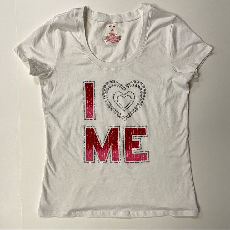 Valentines Themed Women’s T-Shirt Size Medium. Never Worn Never Washed Glitter And Screen Printing Detail On The Front. Pet Free, Smoke Free Home. Trendy Short Sleeve T-shirt With Glitter Print, Spring Crew Neck T-shirt With Glitter Print, Cute Cotton T-shirt With Glitter Print, Cute Crew Neck Top With Glitter Print, Casual Pink T-shirt With Glitter Print, Spring Glitter Print Crew Neck T-shirt, Spring Cotton T-shirt With Glitter Print, Casual T-shirt With Glitter Print, Casual Glitter Print T-shirt For Spring