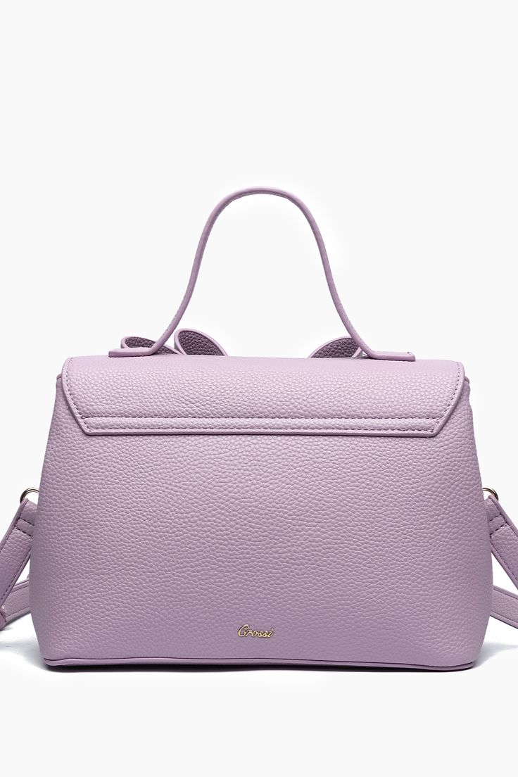 Effortlessly chic, the Jasmine Bowtie Crossbody Purple Bag is the perfect compact size that exudes modern elegance. Gold tips and ornaments with functional compartments to aid in a day of exploring the city or a classic dinner date. - 9 3/4"W x 7"H x 5"D - Luxurious Vegan Leather - Top handle drop: 4'' - Strap: 23" Adjustable/Detachable - Magnetic snap and zipper - 1 inner compartment divider, 1 inner zipper pocket Purple Bag, Gold Tips, Hair Accessories Gift, Dinner Date, Modern Elegance, 7 H, Leather Top, Long Tops, Short Tops