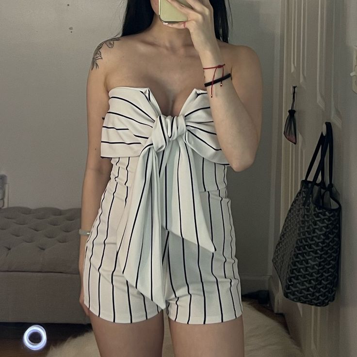 Black & White Stripe Romper With Front Tie Nwt Size Small (Fits Like A Xs) Casual White Jumpsuits And Rompers For Night Out, White Casual Jumpsuits And Rompers For Night Out, Chic White Jumpsuits And Rompers For Day Out, White Jumpsuits And Rompers For Going Out In Spring, White Jumpsuits And Rompers For Going Out, Chic Striped Jumpsuits And Rompers For Night Out, Denim Short Romper, Crochet Jumpsuits, Fashion Nova Jumpsuit