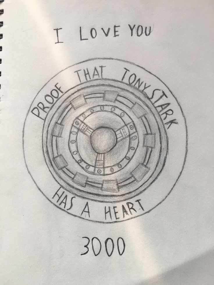 a spiral notebook with the words i love you written on it and an image of a circular