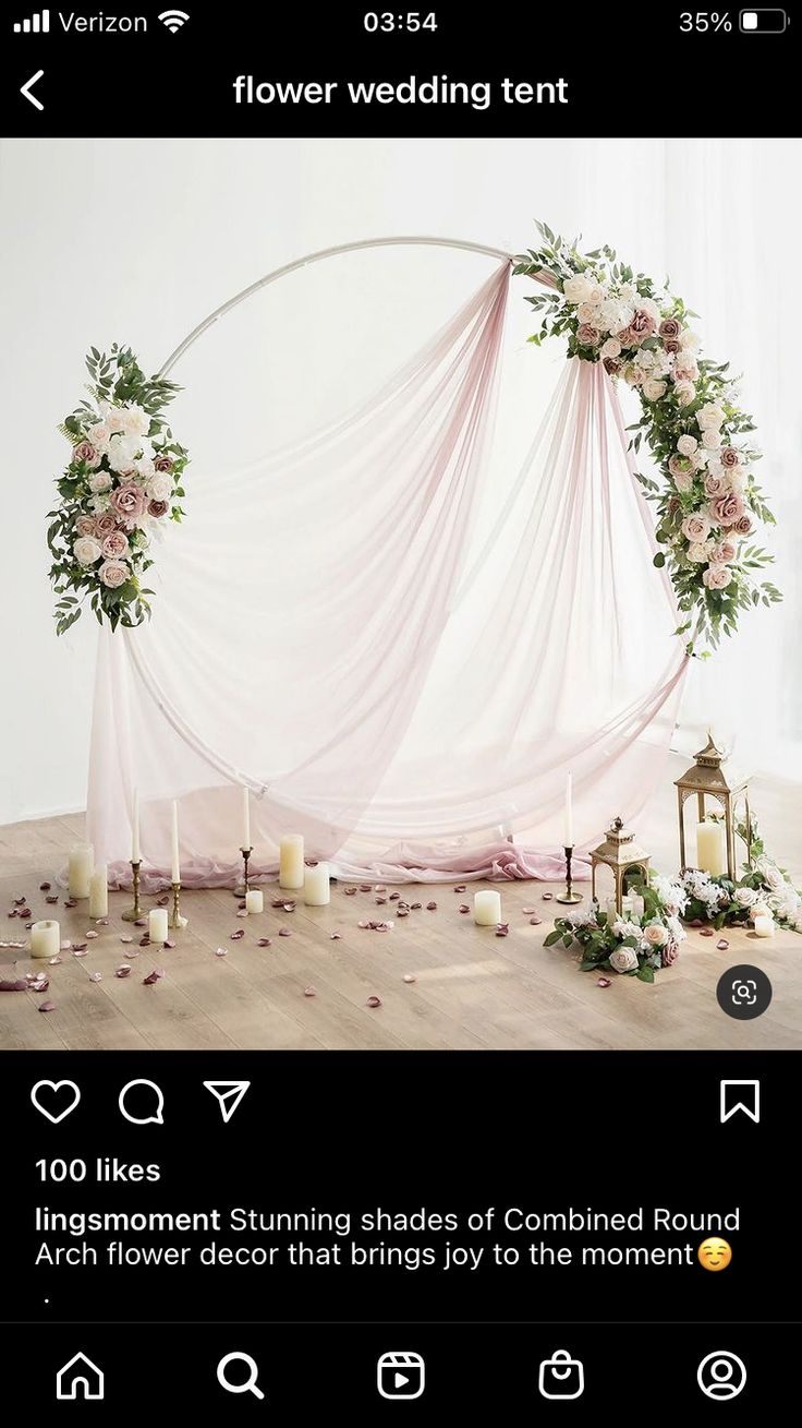 the wedding arch is decorated with flowers and candles