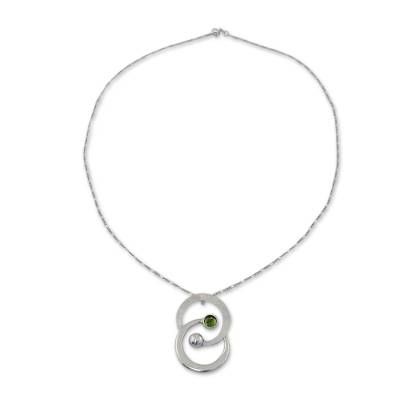 Working in sterling silver Mariana Llanes pays tribute to the zodiac sign of Gemini. The finely handcrafted necklace features peridot's green tonalities. .925 Sterling silver Fine Jewelry Silver Necklace For May Birthstone, Silver Fine Jewelry Necklace For May Birthstone, White Gold Peridot Jewelry With Birthstone, Round Peridot Birthstone Necklace, Sterling Silver Necklace For May Birthstone, Modern Silver Birthstone Necklaces, Modern Silver Birthstone Necklace, White Gold Peridot Jewelry For May Birthstone, Silver Necklace For May Birthstone Anniversary