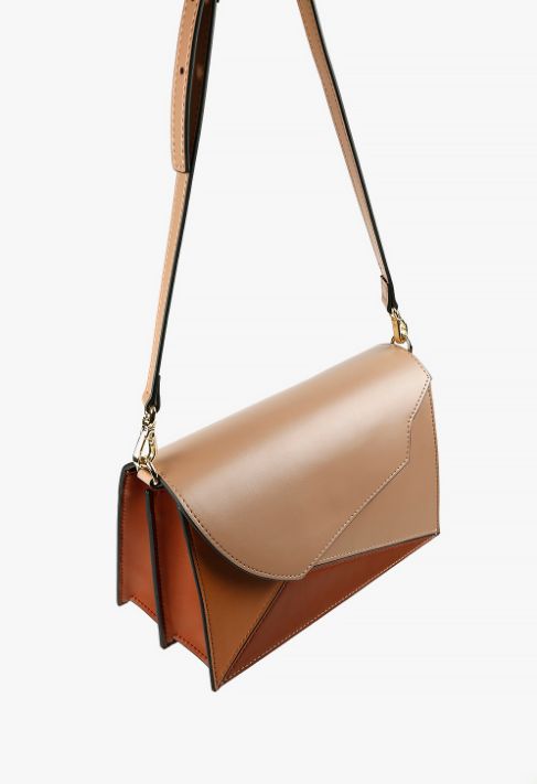 Beautifully handcrafted structured shoulder handbag with a fold-over flap and inside-flap magnetic closure. The Angle Patch beige structured handbag has an unusual geometric design and an adjustable shoulder strap. The two gussets are unique and functional with two interior compartments. One interior credit card pocket. Adjustable shoulder strap length 43 inches long. Handbag measures approx. 8.5 x 3.5 x 5.5 inches. A classic elegant handbag in warm beige, tan, and brick orange leather. The perf Beige Flap Bag With Magnetic Closure For Everyday, Modern Brown Flap Bag With Top Handle, Beige Satchel With Flap For Formal Occasions, Beige Flap Satchel For Formal Occasions, Modern Beige Satchel With Magnetic Closure, Beige Satchel With Magnetic Closure For Office, Beige Office Satchel With Magnetic Closure, Formal Beige Satchel With Flap, Envelope Office Bag With Magnetic Closure