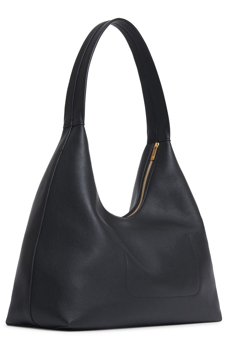 Slouchy and spacious, this oversized hobo bag is made in Italy from soft, grained leather with a supple suede lining and simple shoulder strap. Top zip closure Shoulder strap Calfskin-suede lining Leather Made in Italy Designer Handbags Sleek Hobo Bag With Removable Pouch For Everyday, Modern Hobo Bag With Zipper Closure For Office, Office Hobo Bag With Zipper Closure And Double Handle, Textured Leather Hobo Shoulder Bag For Work, Workwear Satchel Hobo Bag With Smooth Grain, Smooth Grain Satchel Hobo Bag For Work, Black Hobo Bag With Zipper For Work, Office Hobo Bag With Gold-tone Hardware, Sleek Soft Leather Hobo Bag For Everyday Use