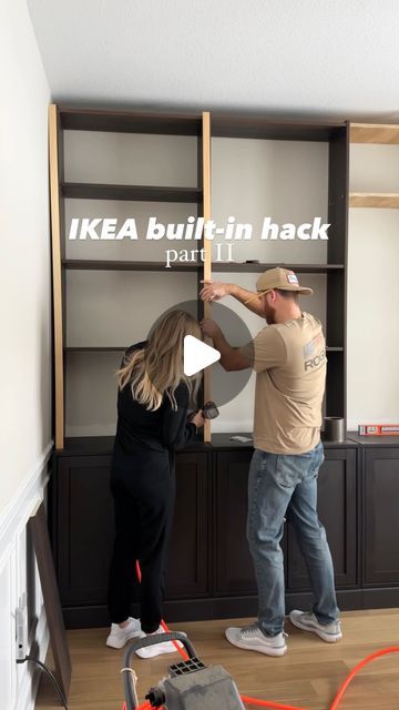 two people standing in front of a bookcase with the words ikea built - in hack on it