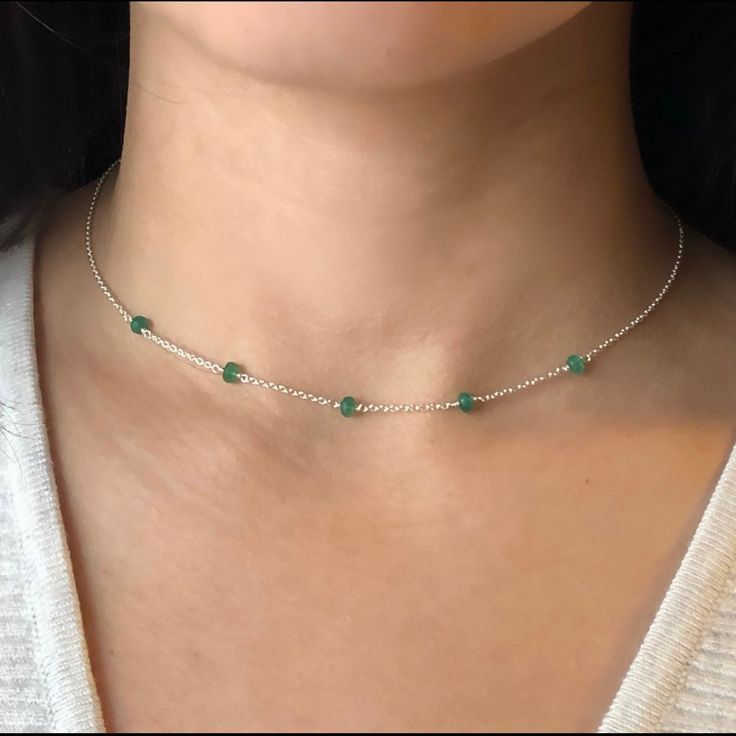 This Thin And And Minimal Necklace Is Designed With 5 Tiny, Genuine, Zambian Emerald Gemstones, Evenly Spaced Along A Dainty Sterling Silver Chain And Completed With A Sterling Silver Lobster-Claw Clasp. These Earth-Mined Stones Are Finely Faceted And Reflect Light Beautifully. Note, The Five Gems Are Placed Only On The Focal Segment Of This Necklace For A True Minimal Look. Genuine Emerald Is The Symbol Of Spiritual Awareness, Protection, Love, And Wisdom. This Dainty And Minimalist Necklace Is Accessories For Prom, Emerald Choker, Birthday Details, Water Pearl Necklace, 16 Inch Necklace, Beaded Necklace Designs, Present For Her, Chocker Necklace, Minimal Necklace