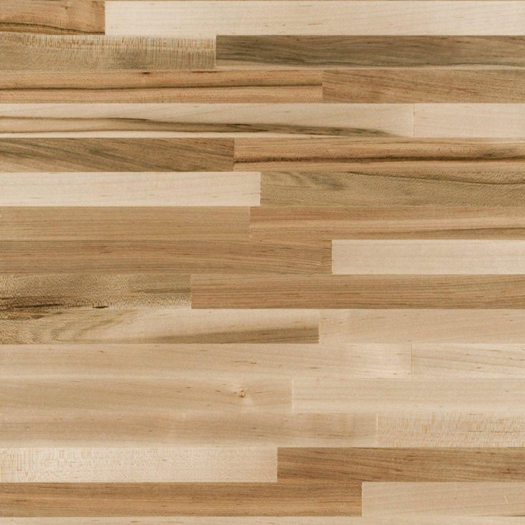 a close up view of wood flooring with different patterns and colors on it's surface