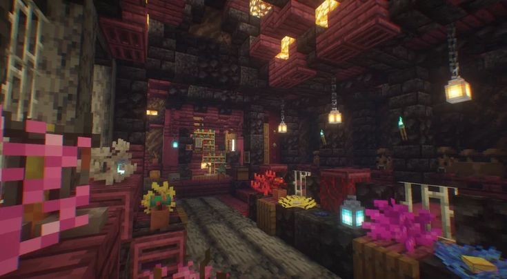 the inside of a minecraft house with lots of decorations and lights hanging from the ceiling